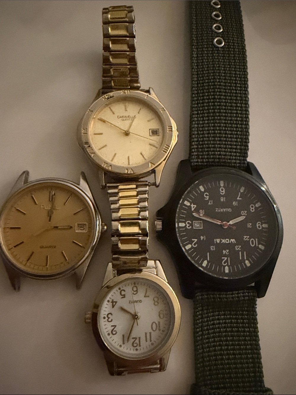 Lot of 4 watches, Pulsar, Carvella..